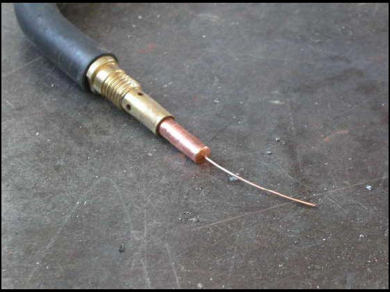 Screw tip on MIG welding torch