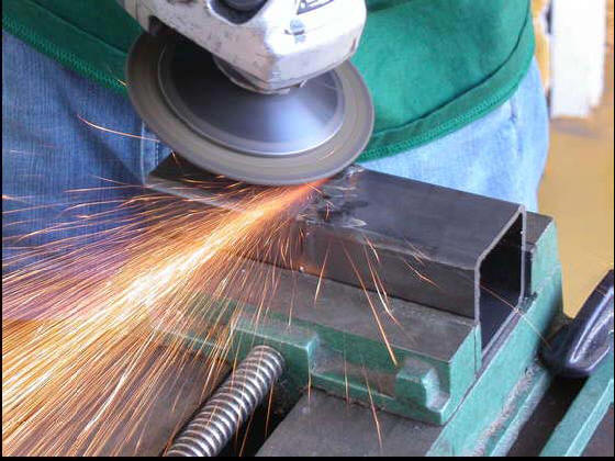 grinding a MIG welded tube
